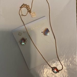 Beautiful shiny Kendra Scott necklace with matching earrings set in rose gold
